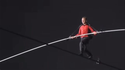 Today in history! Nik Wallenda walks across Niagara Falls on tightrope! On June 15, 2012, 33-year-old aerialist Nik Wallenda becomes the first person to walk across high wire stretched over Niagara Falls, which lie on the border between New York state and Ontario, Canada. Wallenda started around 10:15 p.m. from the American side and crossed some 200 feet in the air on a 2-inch-wide steel cable strung over Horseshoe Falls, the largest of the three falls that make up Niagara Falls. He carried a 40