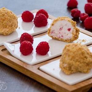 11K views · 549 reactions | Raspberry Cheesecake Bites are bite-sized bursts of sweetness, with a creamy cheesecake filling, coated in biscuits crumbs. It’s pretty hard to resist it. #CheesecakeBites #RaspberryDelight | Home Cooking Adventure | Facebook