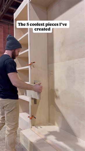 Jacob Wolfe on Instagram: "You won’t believe number 5! 1.) Hidden Murphy-bed bookshelf. 2.) Custom lacquer and burl wood cabinet for a @magnolianetwork tv show! 3.) Modern fluted cabinet in walnut with custom metal base by @zeckhandcrafted 4.) 18foot custom conference table for JR-Motorsports! 5.) High Altar in solid White Oak for St Joseph’s College Seminary 🙏🏻"