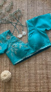 Ivory liquid shimmer tissue saree with contour hand embroidery paired with Teal raw silk blouse | Priti Sahni Designs | Facebook