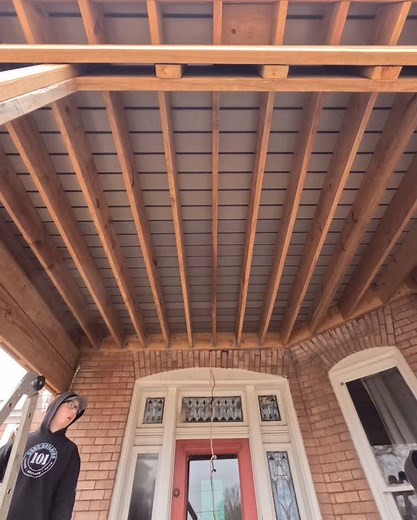 Installing furring strips today below our framing as nailers for the all-black aluminum ceiling we’ll be installing to complete the finished look underneath this historical restoration project. 🖤 The ceiling is strictly aesthetic the upper deck is already fully waterproof using the dexerdry system. 💧 We’ll be wrapping this up with six newcastle steel 6x6 support posts in black and all-black trim to match the architecture and deliver a clean modern finish to this historic property. 🎥 full prog