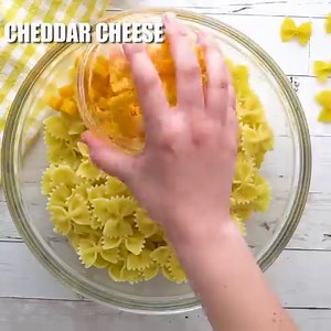 CREAMY BOW TIE PASTA SALAD - Delicious! Recipe --> http://bit.ly/3lrWdLp This Creamy Pasta Salad is always a huge hit at Summers cook outs! A delicious mixture of pasta, crisp peas, loads of ham and cheese - all tossed with an incredible dressing! | Kitchen Fun With My 3 Sons