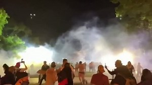 Police shoot tear gas at BLM protesters as fires blaze outside White House