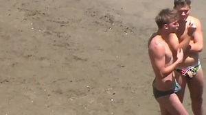 Speedo beach boy with boner