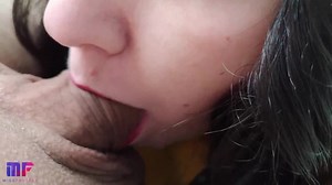 Sensual and detailed blowjob with red lips, close-up