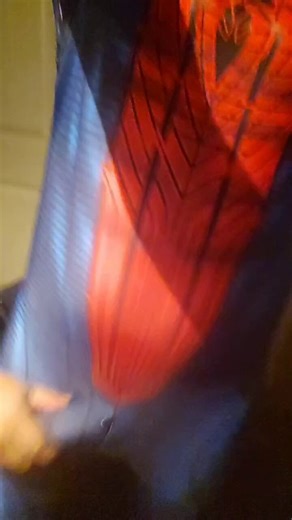 I stand behind spiderman and began to pull his extremely hard dick down between his legs as I begin to stroke his huge hard dick hard feeling his huge dick throb hard against my hand, Spiderman is now feeling his skin-tight suit putting so much pressure on his dick the PAIN PLEAS