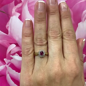 Vintage Ruby & Diamond Ring - - - - Red & White gems for 🍁 Canada 🍁 Day! This vintage ring features an oval facetted ruby .43ct, set with a 12 diamond halo in 18kt yellow and white gold. Size 6.25 and easily sized. More photos, pricing and full description available by tapping the shopping bag 💼 icon on your screen or online at www.cynthiafindlay.com with the product code 88622. Facebook: www.cynthiafindlay.com/antique-vintage-estate-jewellery/rings/ruby/vintage-ruby-and-diamond-ring-88622.ht