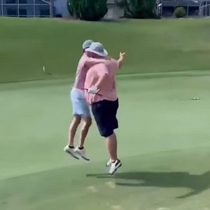 The only thing better than this guy's amazing buried bunker shot was the celebration