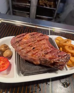 32oz Prime Matured Cote De Boeuf Steak 🥩 served on hot volcanic rock… ready to be carved and cooked at your table… #steaklovers #steakdinner #steak #steaktime #steakporn #steaklover #steakhouse | Cattlemans Steakhouse