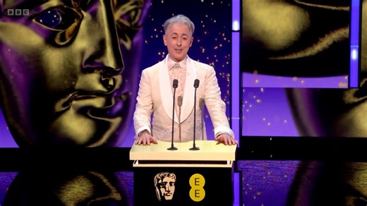 Alan Cumming explains why viewers may have heard 'heckling' during Bafta Film Awards