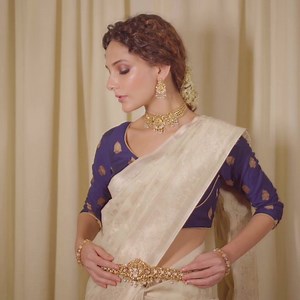 2.4K views · 28 reactions | Experience the grandeur of South Indian Temple Jewelry Collection, a testament to the rich heritage of Indian jewelry. Our intricate designs and radiant craftsmanship pay homage to the timeless beauty of tradition. Adorn yourself with the allure of temple jewelry and embrace the essence of elegance. #tarinika #tarinikajewelry #IndianFashionJewelry #SouthIndianTempleJewelry #IntricateCraftsmanship | Tarinika Jewelry | Facebook