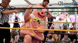 #ThrowbackThursday Who remembers when Mr Blobby went full on wrestling superstar at Gloworm Festival 2022? The moment he stepped into the ring and stole the show was LEGENDARY! 🤼‍♂️✨ From the crowd’s cheers to Blobby’s questionable wrestling moves, it was a moment we’ll never forget! 😂 #ThrowbackThursday #MrBlobby #GlowormFestival2022 #FamilyFun #FestivalVibes #WrestlingBlobby | Gloworm Festival