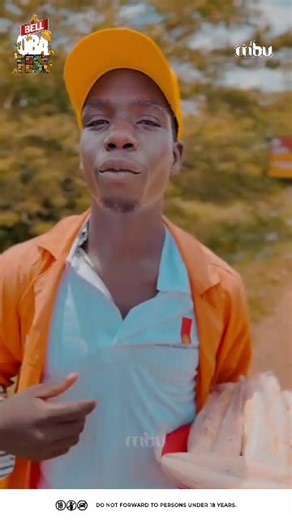 Emma Gang, real name Emmanuel Musasizi, a trader at Kafu, expresses his joy with Bell Lager and his newfound favourite flavour #BellObaFest | Mbu