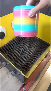 Shredder Vs Giant Slinky #shreddermachine #shredder #slinky #oddlysatisfying #satisfying | Oddly Strange