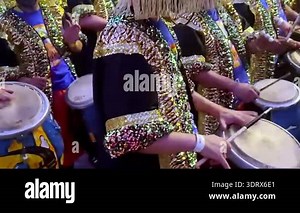 Montevideo, February 7 2026: Candombe comparsa women dancers in the prelude of the famous desfile de llamadas carnival celebrations in Montevideo, Uruguay.