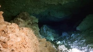Cave diving in underwater caves of Yucatan Mexico cenotes.