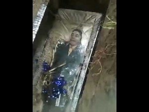 Scary exhumation of human remains after 15 years: body in the coffin is intact [looks like Maradona]