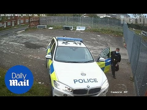Policeman caught urinating in public on home security camera