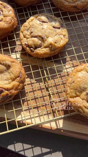 2.7K views · 33 reactions | the brown butter chocolate chip cookies. this is my favorite cookie to date. it has everything i need and want: crispy edges, chewy soft centers with two different types of chocolate and walnuts (i’m a nut girl). recipe link in profile. | A Cozy Kitchen | Facebook