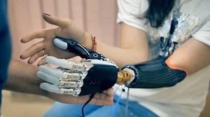 clip-31360159-young-woman-trying-wireless-bionic-prosthesis-4k