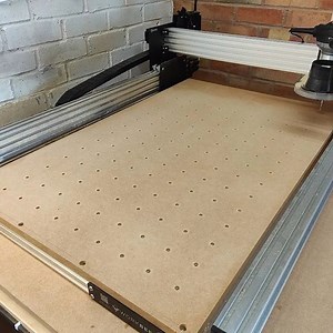 @geekgotwood, the Makers Central winner, has fired up their WorkBee Z1+ CNC Machine! The first assignment - Drill hundreds of holes for the spoiler board. | Ooznest | Facebook