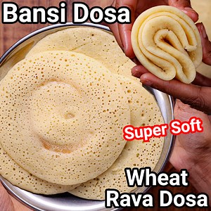 Broken Wheat Rava Dosa Recipe: bit.ly/3ZBM5Df Rava Idli Recipe: bit.ly/2xyeuPq Wheat Rava Dosa Recipe | Bansi Rava Dosa | Broken Wheat Dosa with detailed photo and video recipe. An extremely simple and innovative healthy instant dosa recipe prepared with broken wheat or more popularly known as bansi rava dosa. It is instant and very simple to prepare and does not require all the hassle and complex steps of soaking, fermenting, etc. It can be a popular and favorite morning breakfast recipe for al