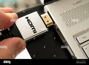 HDMI line connecting the audio and video system of notebook to projectoror TV. 4K high-speed signal transmission. High quality signal cable for profes Stock Photo - Alamy
