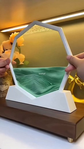https://amzn.to/40oZX6F 🌊✨ Bring the beauty of nature into your home with our 3D Deep Sea Moving Sand Art! This mesmerizing piece of decor showcases liquid motion as sand flows to create ever-changing, calming landscapes. Perfect for relaxation, home decor, or a unique gift for both kids and adults! 🎁 Add a touch of serenity and creativity to any space. Shop now with #LootLyf and let the magic of sand art transform your home! 🌟 🖼️ Relax, unwind, and enjoy the soothing beauty of nature indoor