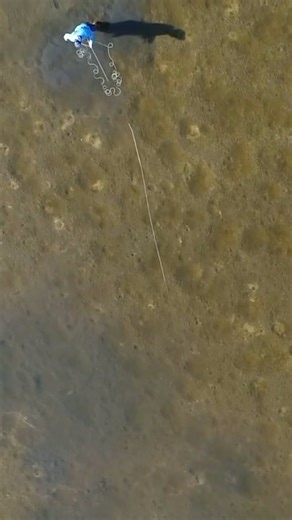 Walking on the moon? 🌕 No, we’re wade fishing in West Bay, where you can catch anything from redfish and trout to flounder! | Chasin' the Sun Fishing Show