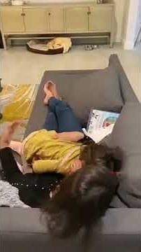 Kid Enjoys Getting Tickled By Woman on Couch - 1169869-2