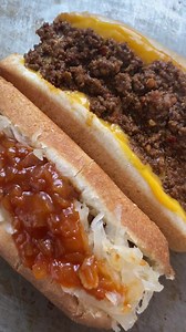 Which do you prefer? New York Style or Chili Cheese? A New York Style hot dog is brown mustard, sauerkraut, and red onion sauce. Our delicious homemade Chili and Cheese dogs don’t need anything else on them! #nyhotdogs #hotdogs #nyhotdogking #besthotdogs #nylocal #veteranowned #bestfood | The Hot Dog King