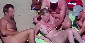 Beautiful bitch by his husband and strangers at beach