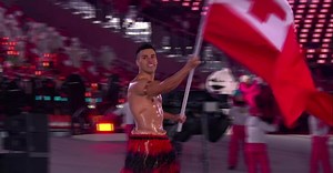 Shirtless Tonga flag bearer does it again!