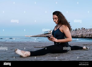 Female ballet dancer using mobile hi-res stock photography and images - Alamy