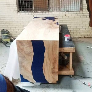 Camphor timber slab table with waterfall edge. Blue casting resin. First coat danish oil. #timberslab #table #furniture #homedecor #sydney #art | Go Natural Timbers - Slabs and Burls