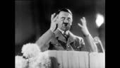 / Adolf Hitler gives passionate speech from podium / Hermann Goering...