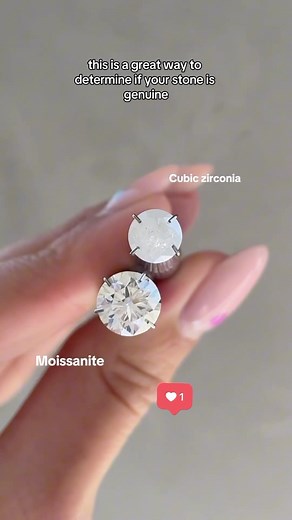 Follow ❤️👉 @malik_gemstrade For More . !! . Testing Moissanite and cubic zirconia by flame involves observing their reactions to heat. Moissanite tends to withstand high temperatures and maintains its brilliance, while cubic zirconia may show signs of damage, such as discoloration or cloudiness, due to its lower heat resistance. This method helps distinguish between these gemstones based on their unique thermal properties. . . . . Credit @cullenjewellery #moissanite #cubiczirconia #gemstonetest
