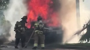 Tesla catches on fire in at tow yard after burning in a crash