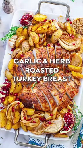 Juicy Garlic & Herb Turkey Breast - the most delicious turkey ever!! This recipe is great for a smaller Thanksgiving dinner! https://tatyanaseverydayfood.com/roasted-turkey-breast/ #thanksgiving #dinner #easyrecipes | Tatyana's Everyday Food