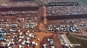6.1K views · 63 reactions | Heavy rains flooded a camp for displaced Syrians near the village of Kafr Uruq in the north of Idlib province, Syria. Children played in the remaining water on Thursday. https://bit.ly/2KBtiGe | AccuWeather | Facebook