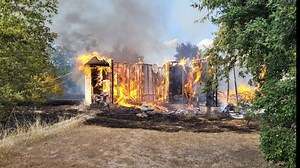 Crews battle structure fire in Manor