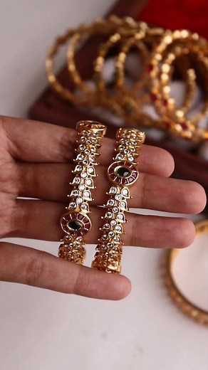 Traditional bangles with a touch of contemporary design for the modern women♥️ Gold look - alike elegant and beautiful AD bangles✨ . . Perfect for your upcoming special occasions! Don't miss out💯 . . Dm to Shop yours now🛍️ #akshavitrends #banglescollection #elegantsets #kempbangles #kadabangle #stonebanglesset #stonebangles #bangles #bridalbangles #bridalbanglesset #czbangles #adbangles #adbanglescollection #afforablejewellery #accessories #jewelry #newarrivals #templejewellery #indianbride #s