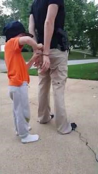 Child operating handcuffs