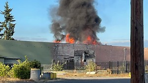 Crews battle 2-alarm fire at former cold storage facility in Puyallup