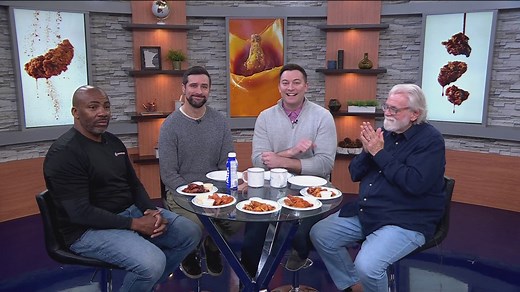 KARE 11 anchors try hot wings challenge