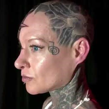 Woman gets tattoo covering half of her face