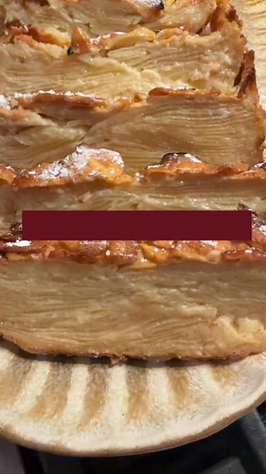 You need this holiday recipe! ✨🍎 Ingredients 5 apples medium to large size, Honeycrisp or SnapDragon 3 eggs 3 tbsp melted butter 1 tsp vanilla 1/3 cup heavy cream (or 2/3 cup milk and do not use any water ) 1/3 cup water 1/2 cup flour 1/2 cup powdered sugar 1 tsp cinnamon 1/4 tsp salt 1.5 tsp baking powder Instructions 1. Preheat oven to 350°F (175°C). Line a 9×5-inch loaf pan with parchment paper. 2. Slice all the apples to 1/8-inch thickness. Keep safety guards in place when using a mandolin.