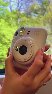 She snaps INSTAX by the seashore  #INSTAX #INSTAXmini12 | instax HQ | Facebook