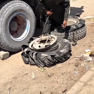 172K views · 2K reactions | A truck tire burst on the road due to the road being hot and is now being repaired. | Restoration King | Facebook