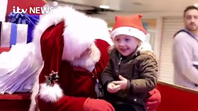 The heart-warming moment Father Christmas communicated with a three-year-old girl using sign language has been captured on film. Read the full story here: http://bit.ly/1loAxQc | ITV News